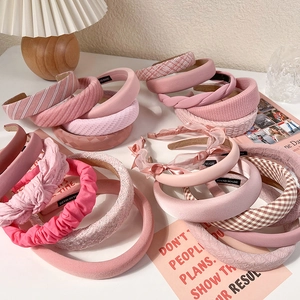 Pink headband set featuring padded sponge and bow designs for a sweet high-top hair look