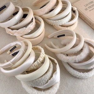Collection of chic beige headbands in satin and faux fur styles for a trendy look