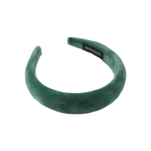 Deep green velvet padded headband with handmade label for high cranial top look