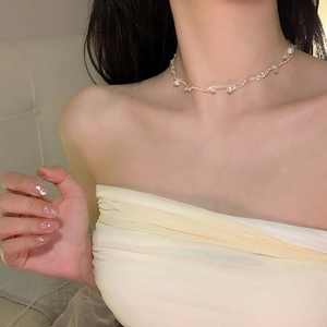 Elegant pearl and zircon choker necklace for women with minimalist fish line design
