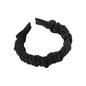 Elegant black pleated scrunchie headband with soft fabric texture and ruffled design