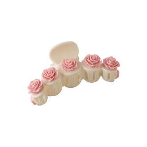 Pink camellia flower claw clip with five 3D roses on creamy white resin hair accessory