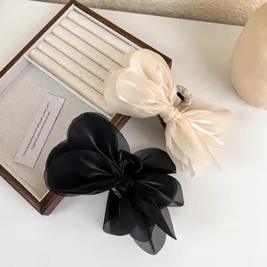 Elegant organza oversized bow hair clips in black and champagne beige set of two