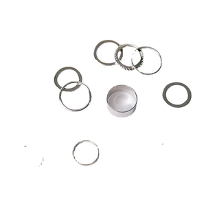 10-piece minimalist silver stackable ring set with smooth and twisted bands on white