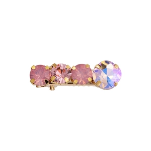Creamy pink rhinestone hair clip with golden metal base for a gentle summer look