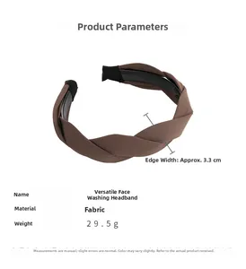 Detail of brown fabric headband with twisted knot design and black non-slip inner teeth