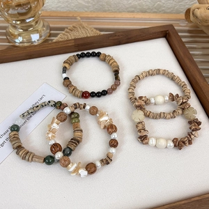 Retro beaded bracelet set with wood, shell, natural stone and baroque pearl accents