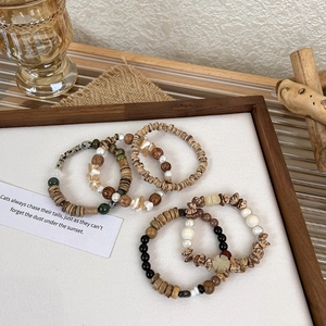 Retro beaded bracelet set with wood, freshwater pearls and shells in bohemian style