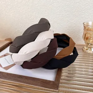 Five-piece set of twisted wide headbands in earth tones for a minimalist fashion style