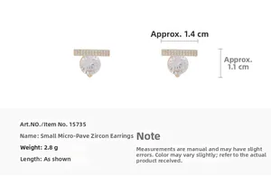 Vue détaillée des boucles d'oreilles en zircon de 1,4x1,1 cm et d'un poids de 2,8 g