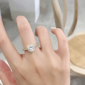 Elegant heart-shaped zircon ring in gold finish with micro-pave diamonds for women