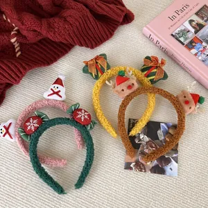 Cute Christmas reindeer and snowman plush headbands with soft faux fur and festive decor