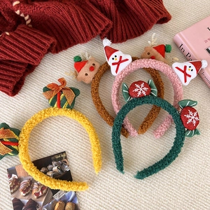 Plush Christmas reindeer antlers headband set with cute pom poms and holiday ornaments