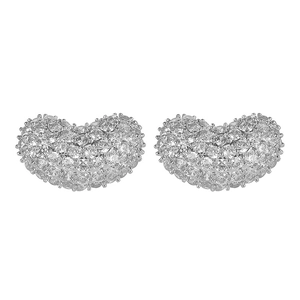 Detailed macro view of pea-shaped 18K silver earrings paved with cubic zirconia