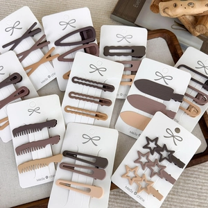 Brown seamless duckbill hair clip set in matte finish for women with earth tone colors