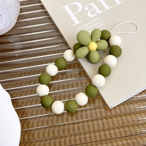 Minimalist olive green and white flower beaded phone strap for universal smartphone use