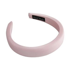 Pink satin padded headband with a handmade label, high-top design for women