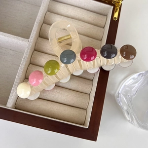 Fashionable beige claw clip with seven colorful beads and high-quality gold spring
