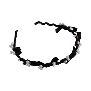 Serre-tête élégant orné de perles blanches et nœuds en ruban de satin noir