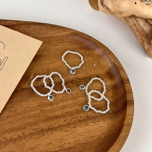 Minimalist elastic silver beaded rings with blue crystal gemstone pendants for women
