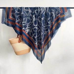 Detail of rope pattern cotton linen scarf with tassel fringe on a hanging display