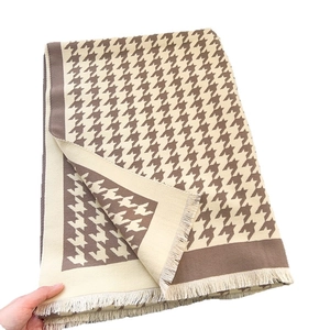 Classic houndstooth patterned scarf in beige and coffee brown with elegant fringe edges