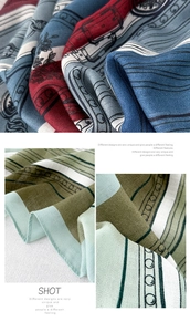 Detail of vintage floral and geometric patterns on soft cotton linen scarves for women
