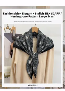 Detail of elegant black and white herringbone silk scarf with camellia flower pattern