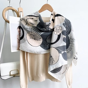 Elegant camellia print cotton linen scarf with geometric blocks in black and beige tones
