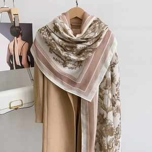 French vintage floral cotton linen scarf styled as a warm oversized shawl on a coat