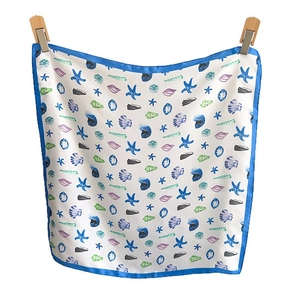 Elegant silk-like scarf with blue ocean patterns and sea life prints on white background