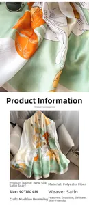 Detail of floral magnolia print long scarf showing satin weave and machine hemmed edges