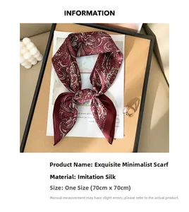 Detail view of red paisley imitation silk square scarf with information on dimensions