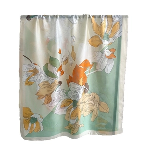 Elegant silk scarf featuring green and yellow lily floral print for women as a shawl