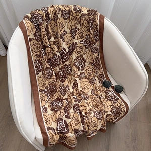 Close-up of floral print cotton linen scarf with elegant rose and chain patterns