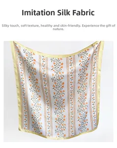 Detail of floral silk scarf showing orange flowers and yellow checkered borders