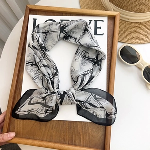 Lightweight breathable black and white silk scarf with abstract geometric circle pattern