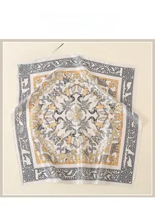 Detail of oil painting style silk scarf with vintage animal print and floral patterns
