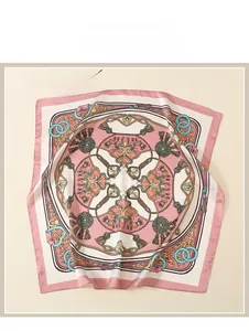 Close-up of pink satin scarf featuring intricate oil painting style baroque patterns
