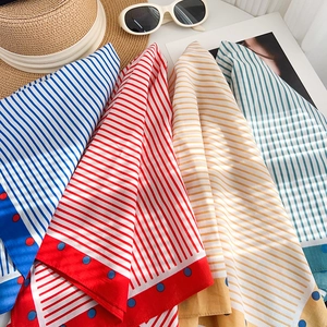 Blue cotton neck scarf with striped patterns and polka dot borders for summer styling