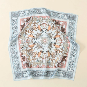 Artistic square silk scarf detail showing vintage animal print and mandala floral pattern
