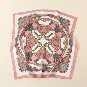 Detailed close-up of premium satin silk scarf with elegant palace floral prints