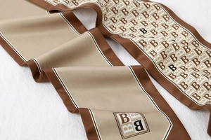 Detail of classic vintage striped silk scarf showing high-quality twill texture and B-pattern