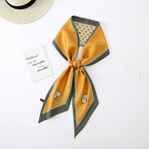 Elegant narrow long silk scarf with yellow and olive B-letter pattern and pointed ends