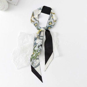 Detail of floral twilly silk scarf with purple flowers and grey chain patterns