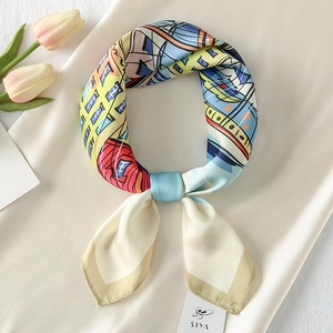 Detailed view of the architectural print silk scarf with fine stitching and chic texture