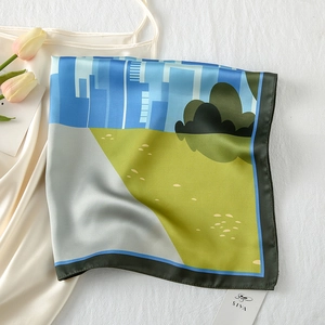 Detailed macro view of an artistic silk scarf with a modern landscape illustration print