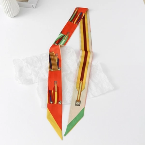 Detail of orange floral Twilly silk scarf with colorful stripes and buckle patterns