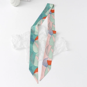 Detail of floral skinny silk scarf with double-sided print and sharp angled edges