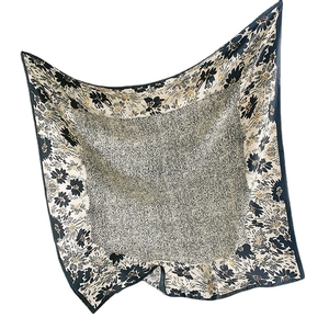 Floral square silk-like scarf with black flower borders and yellow accents on white background